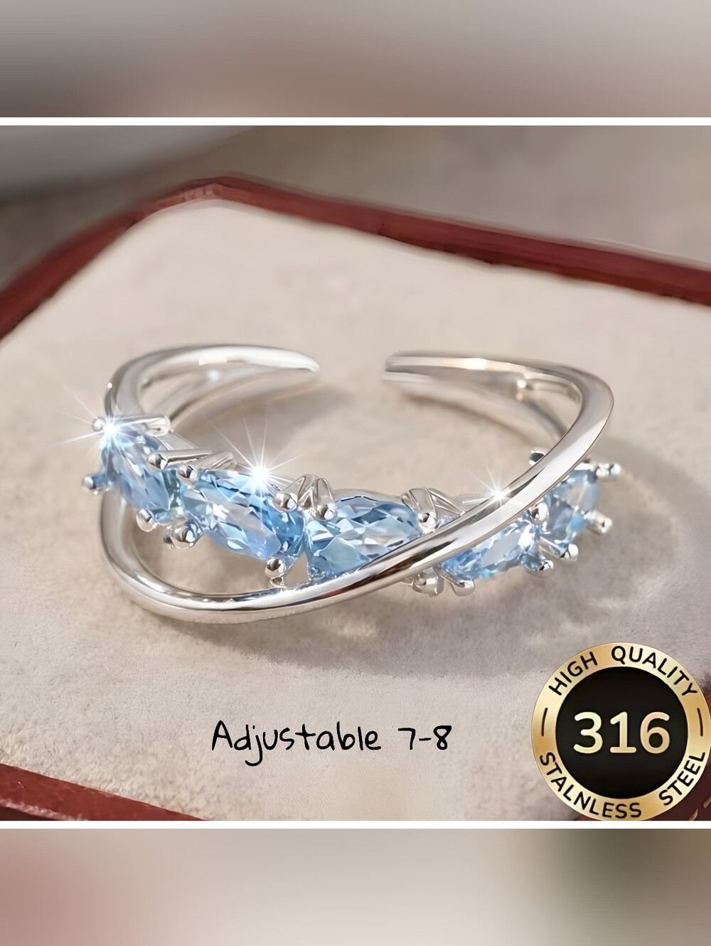'Criss Cross' simulated Aquamarine ring in Stainless Steel, Adjustable 7-8